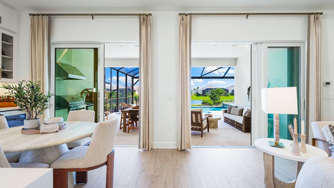 Furnished interior in a model home at Esplanade by the Islands in Naples (Image 31).