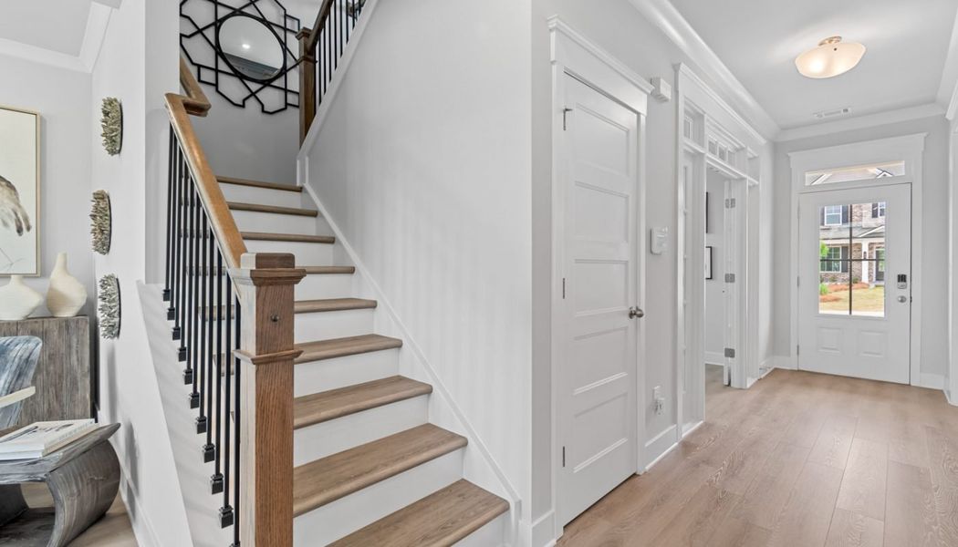 Furnished interior in a model home at Summerlin in Winder (Image 38).