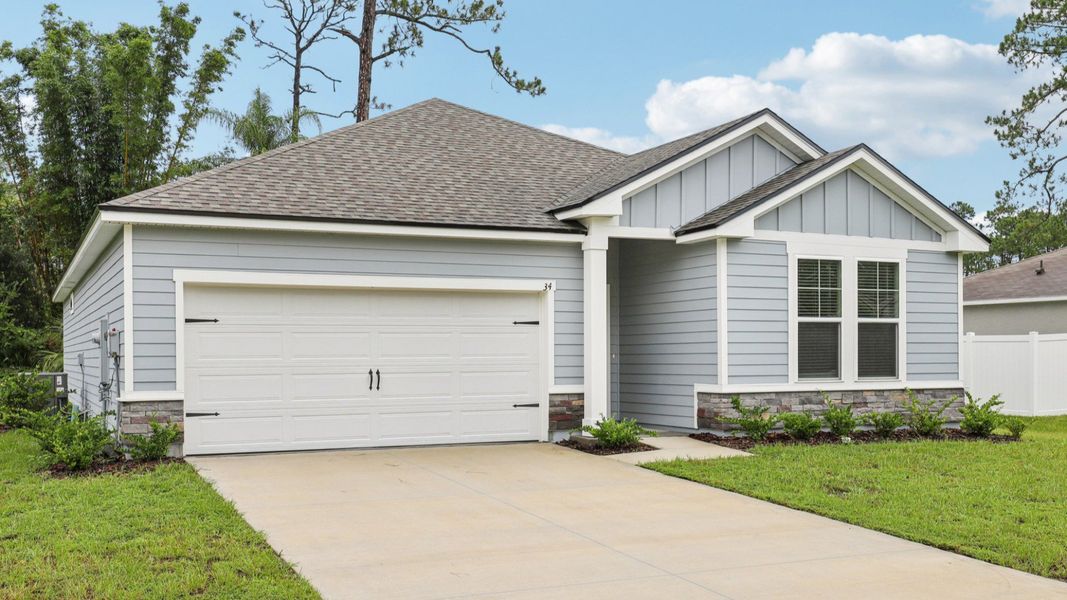 Front exterior of a home in the Palm Coast community, located in Palm Coast, FL (Image 11).