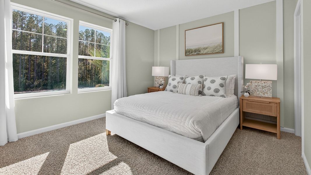 Furnished interior in a model home at Liberty Cove in Yulee (Image 7).