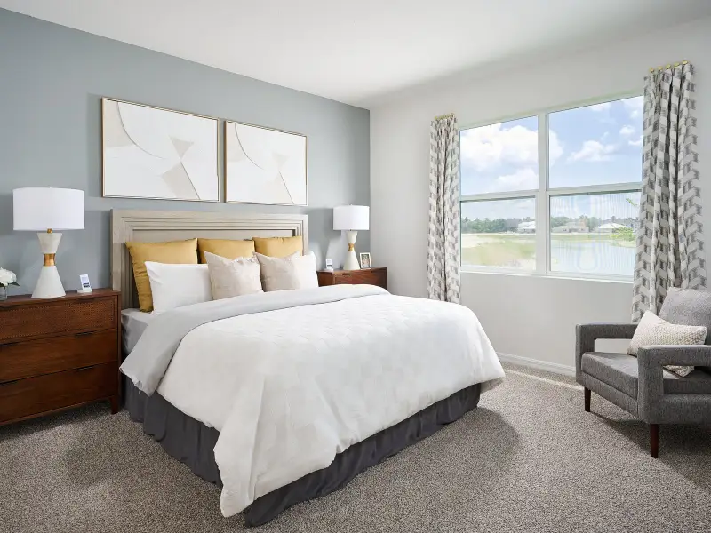 The Primary Bedroom of the Foxglove Model at the Grove at Stuart Crossing.