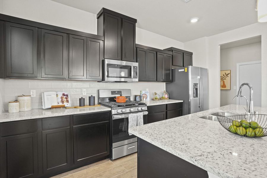 Furnished interior in a model home at Paseos Del Este in Horizon City (Image 3). Furnished interior in a model home at Paseos Del Este in Horizon City (Image 3).