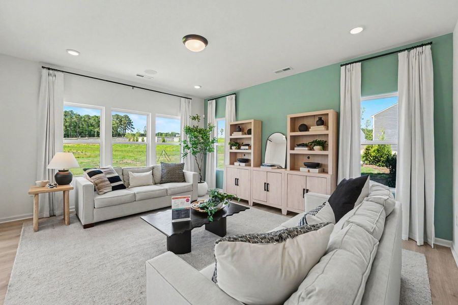 Furnished interior in a model home at White Oak Creek Crossing in Angier (Image 3). Furnished interior in a model home at White Oak Creek Crossing in Angier (Image 3).