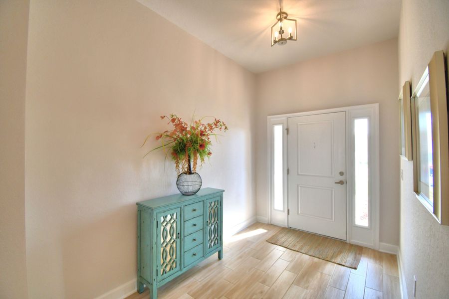 Furnished interior in a model home at Citrus Landing in Davenport (Image 18).