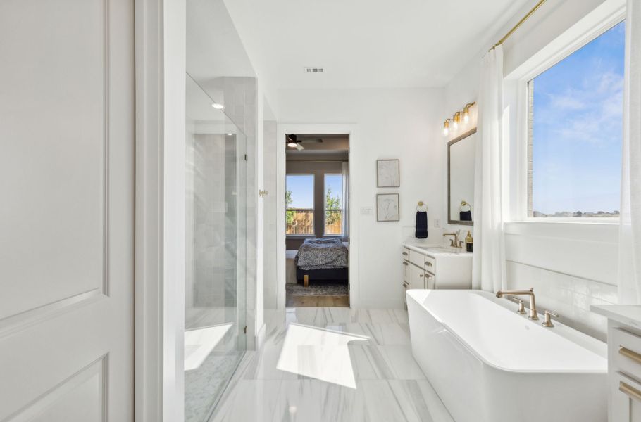 Furnished interior in a model home at Hazelwood 55' Series in Frisco (Image 23).