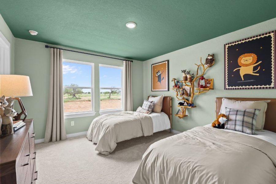 A bedroom with two beds. A bedroom with two beds.