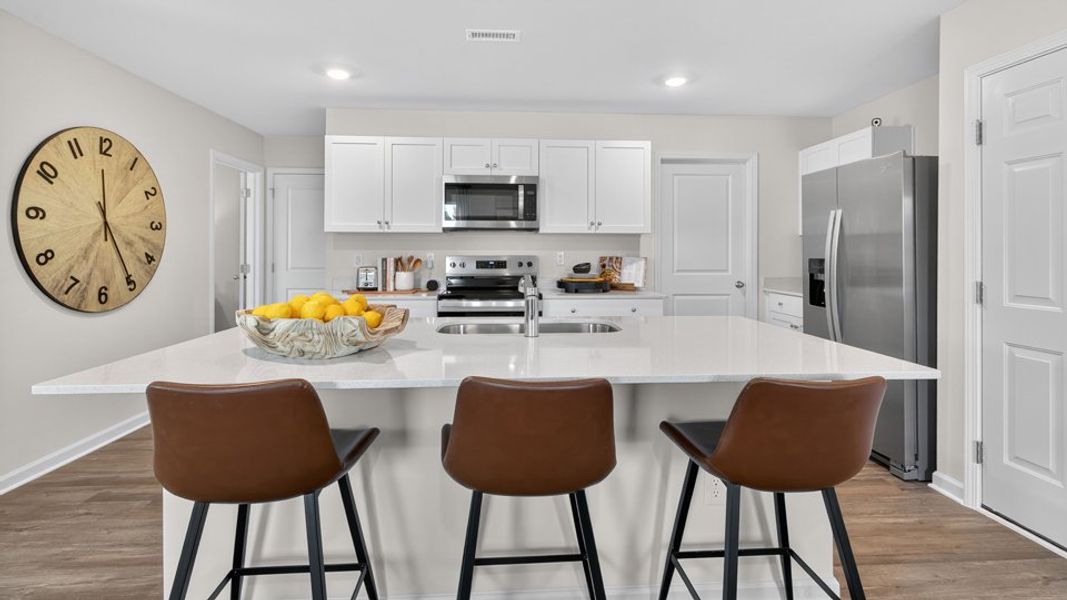 Furnished interior in a model home at Belle Grove in Wendell (Image 10).