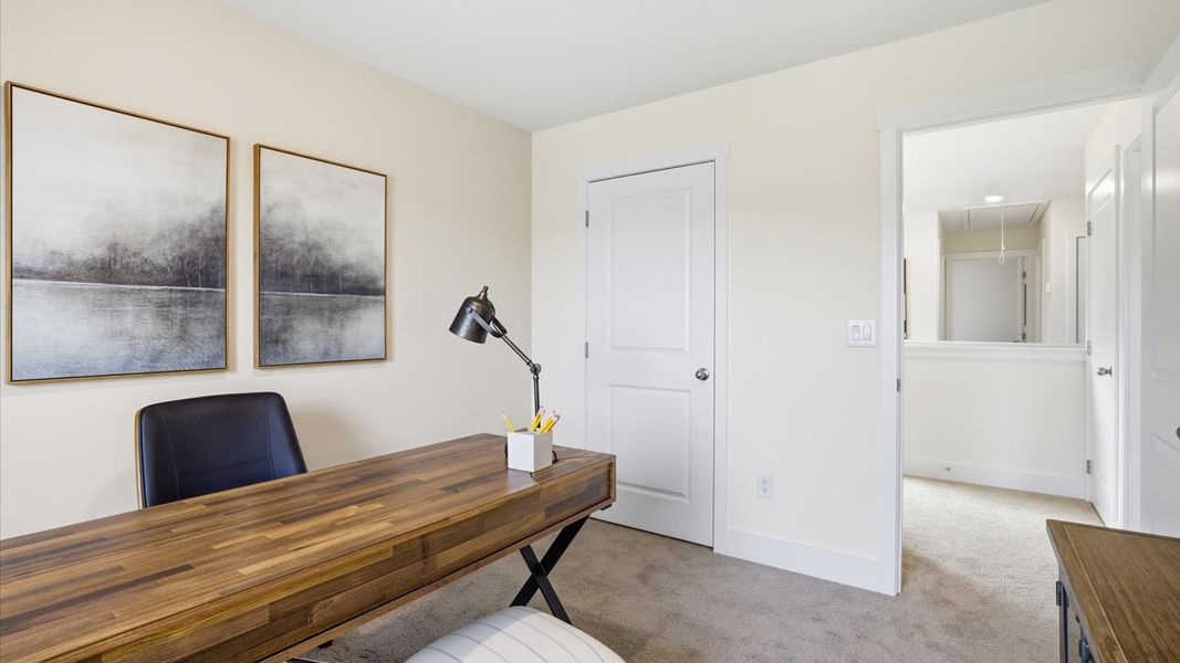 Furnished interior in a model home at Price's Point in Knoxville (Image 40).