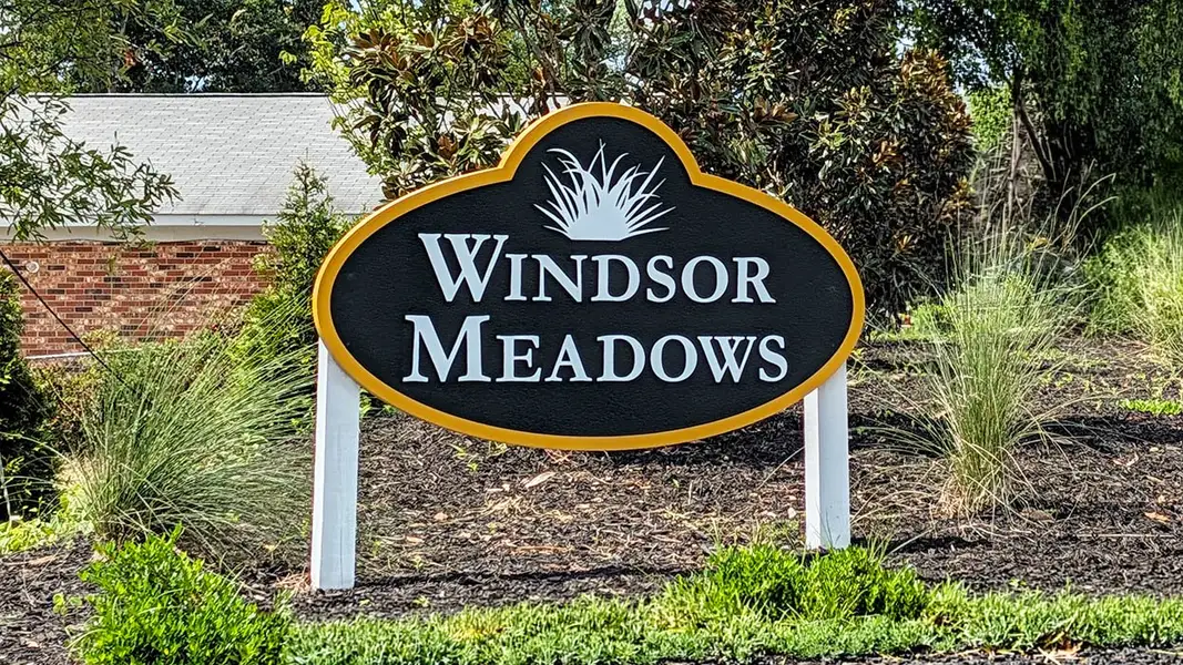 Entrance to the Windsor Meadows community in Augusta, GA, featuring signage and landscaping (Image 1). Entrance to the Windsor Meadows community in Augusta, GA, featuring signage and landscaping (Image 1).