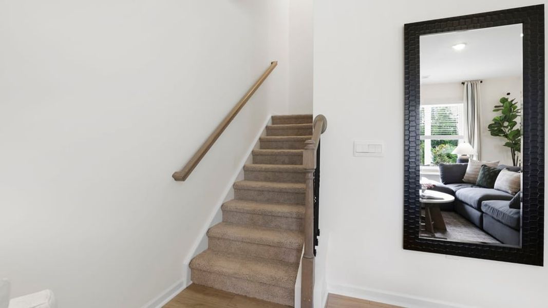 Furnished interior in a model home at Sherwood Gardens in Landrum (Image 29).