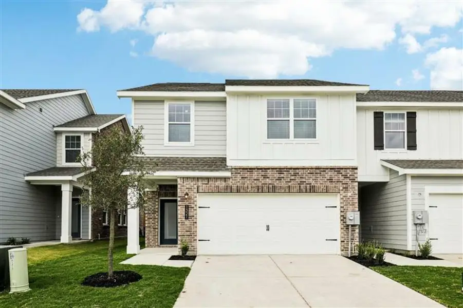 Front exterior of a home in the Broadmoor Village community, located in Cedar Hill, TX (Image 2).