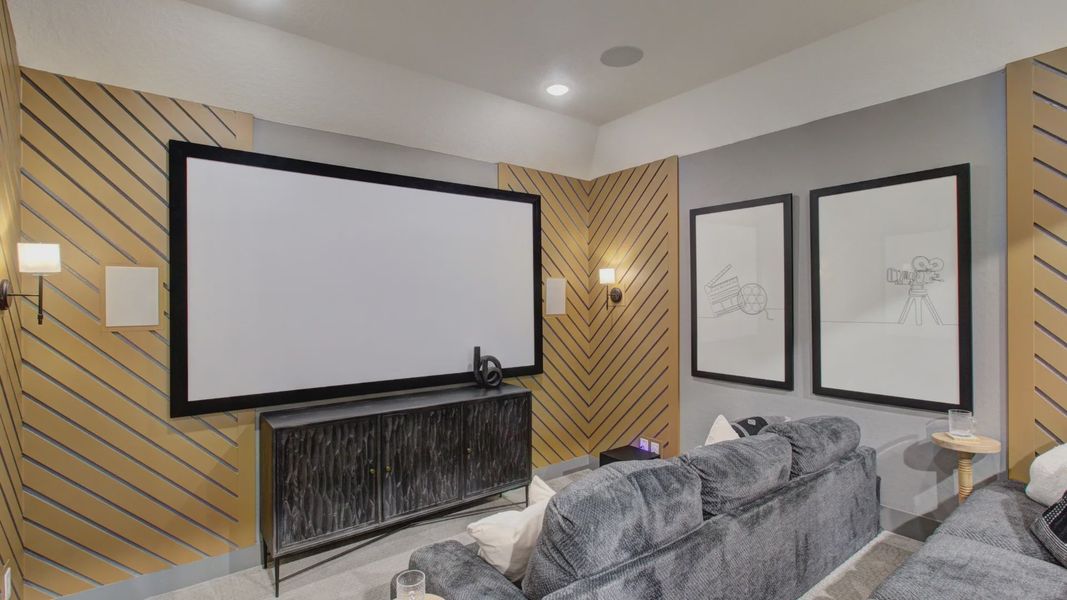 Experience elegant cinema with sleek diagonal wood panels and plush seating in Verandas at the Rim, Texas.