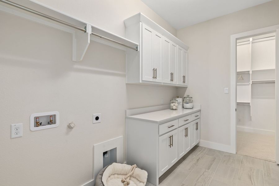 Plan 1640 Laundry Room - Mosaic 60s Model - Photo by American Legend Homes