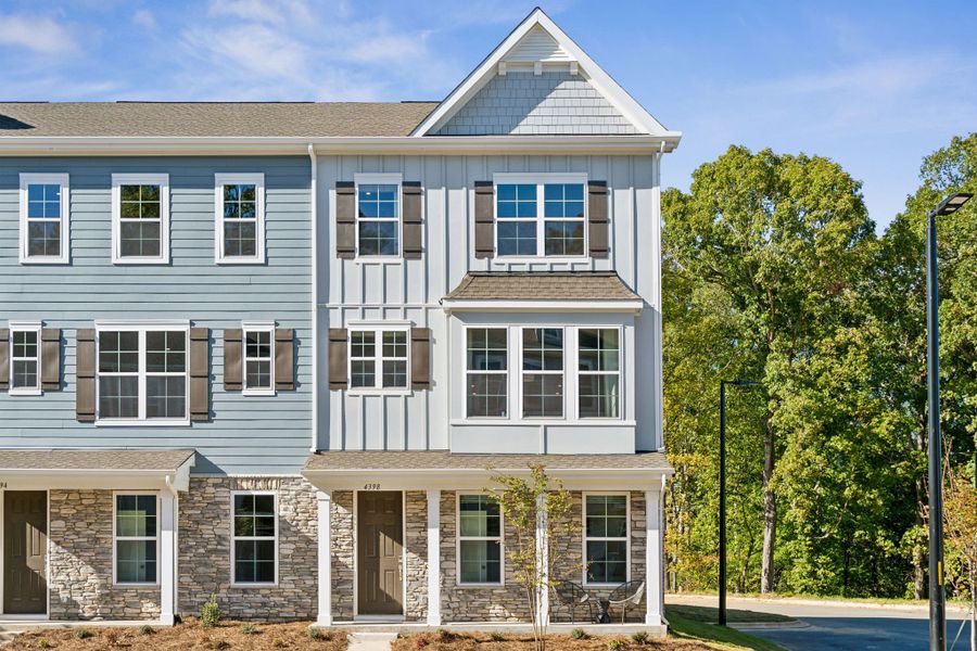 A large building with trees in front of it. A large building with trees in front of it.