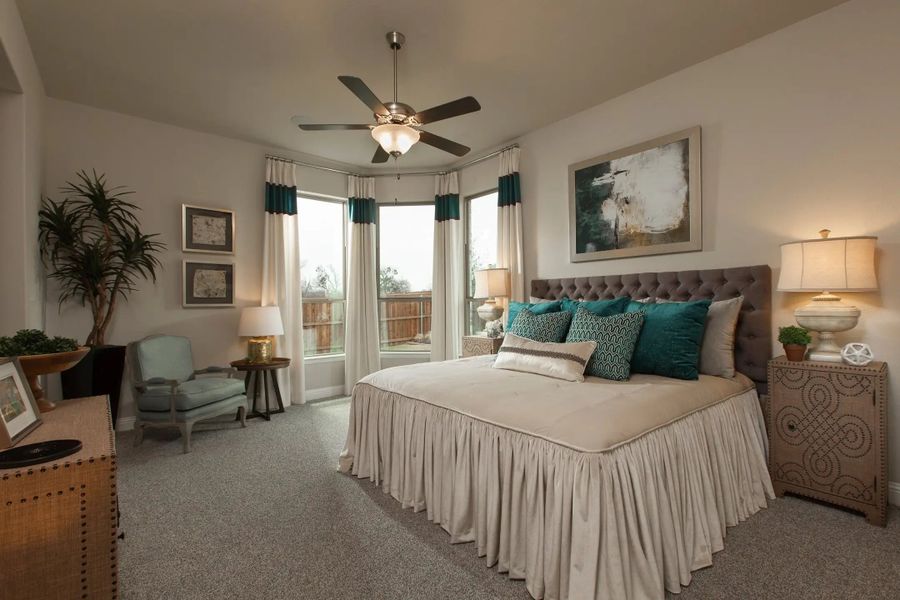 Furnished interior in a model home at Chaparral Park 50' in Oak Point (Image 20).
