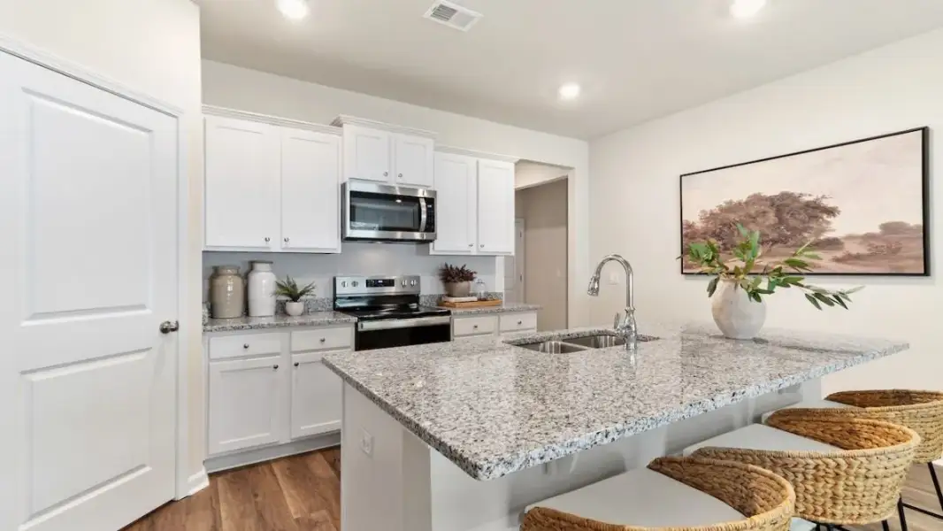 Furnished interior in a model home at Audra Oaks in Denton (Image 9).