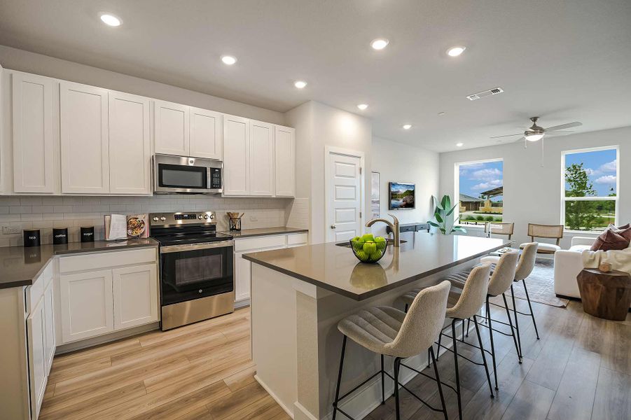Furnished interior in a model home at Double Creek Crossing Townhomes in Round Rock (Image 6).