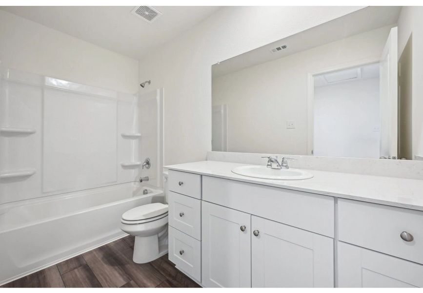 Furnished interior in a model home at Oakfield Lakes in Parrish (Image 10). Furnished interior in a model home at Oakfield Lakes in Parrish (Image 10).