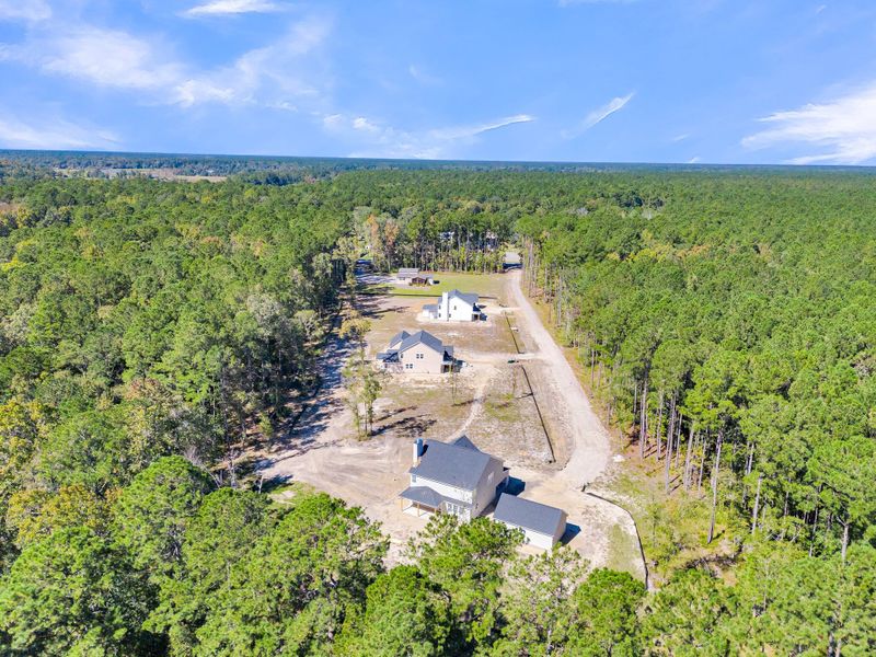Aerial view of the Huger Farms community in Huger, SC, showing layout and nearby surroundings (Image 1).