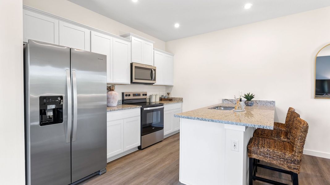 Furnished interior in a model home at Owensby Farms Townhomes in Dayton (Image 6).