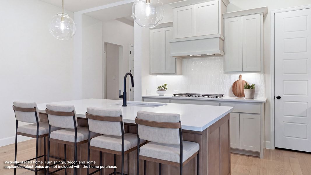 Furnished interior in a model home at Canyon Falls 50' in Northlake (Image 4).