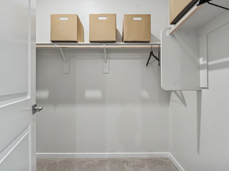 A shelf with boxes on it.