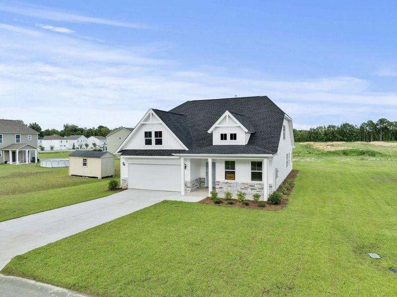 Front exterior of a home in the Pandora's Path community, located in Florence, SC (Image 5). Front exterior of a home in the Pandora's Path community, located in Florence, SC (Image 5).