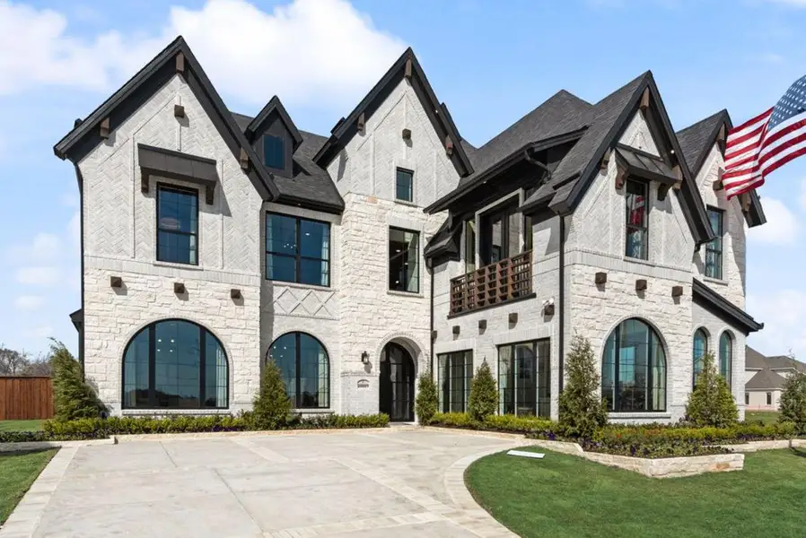 Front exterior of a home in the Chatham Reserve community, located in Providence Village, TX (Image 3).
