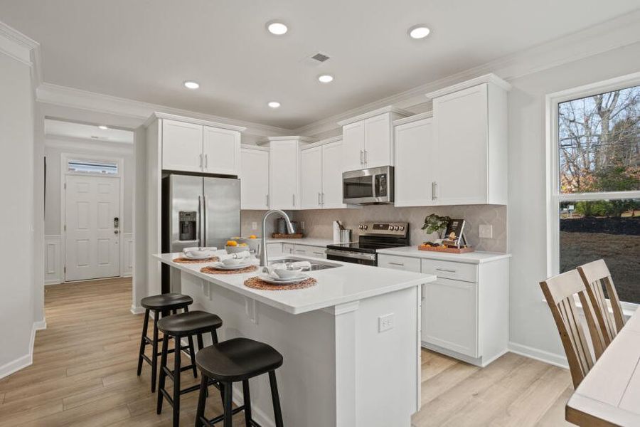 Furnished interior in a model home at East Main Townes in Spartanburg (Image 10).