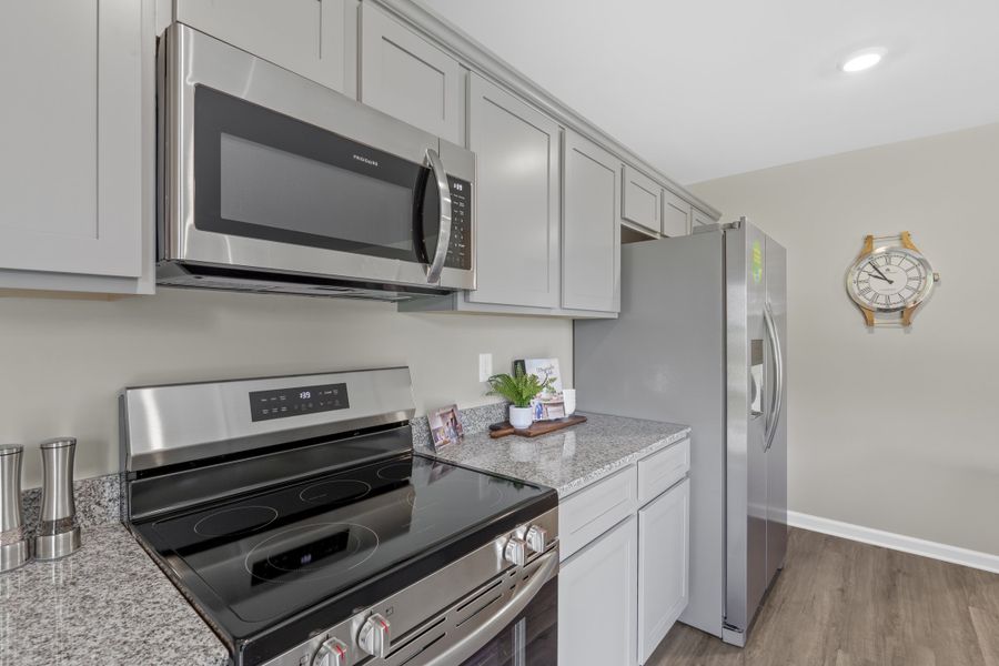 Furnished interior in a model home at Harmon Hill Estates in Hopkins (Image 7).