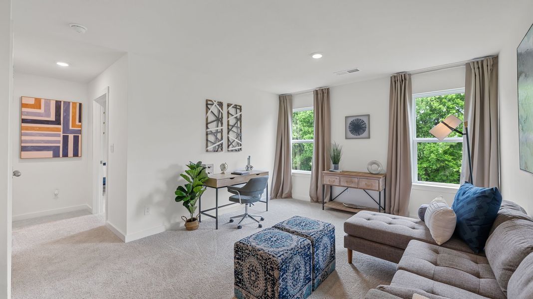 Furnished interior in a model home at Lone Oaks Farm in Cleveland (Image 29).