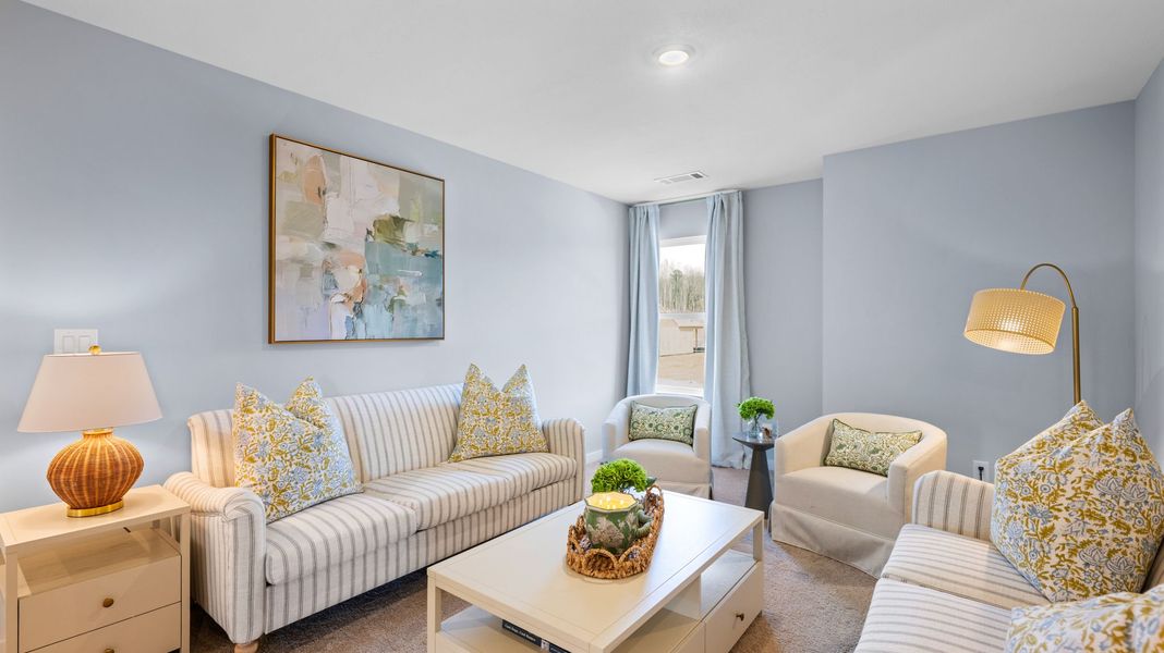 Furnished interior in a model home at Hawks Landing in Apison (Image 28).