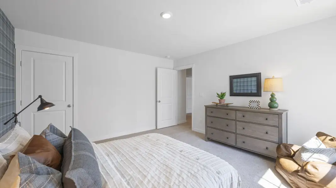 Furnished interior in a model home at Holloway Farms in Cleveland (Image 27).