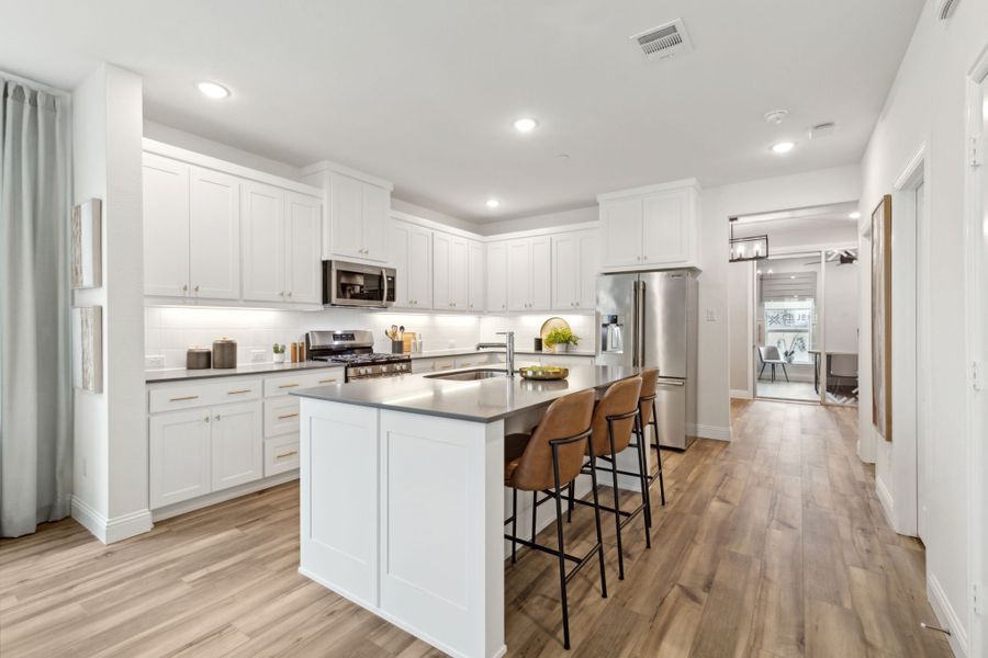 Furnished interior in a model home at Twin Creeks Watters in Allen (Image 16).