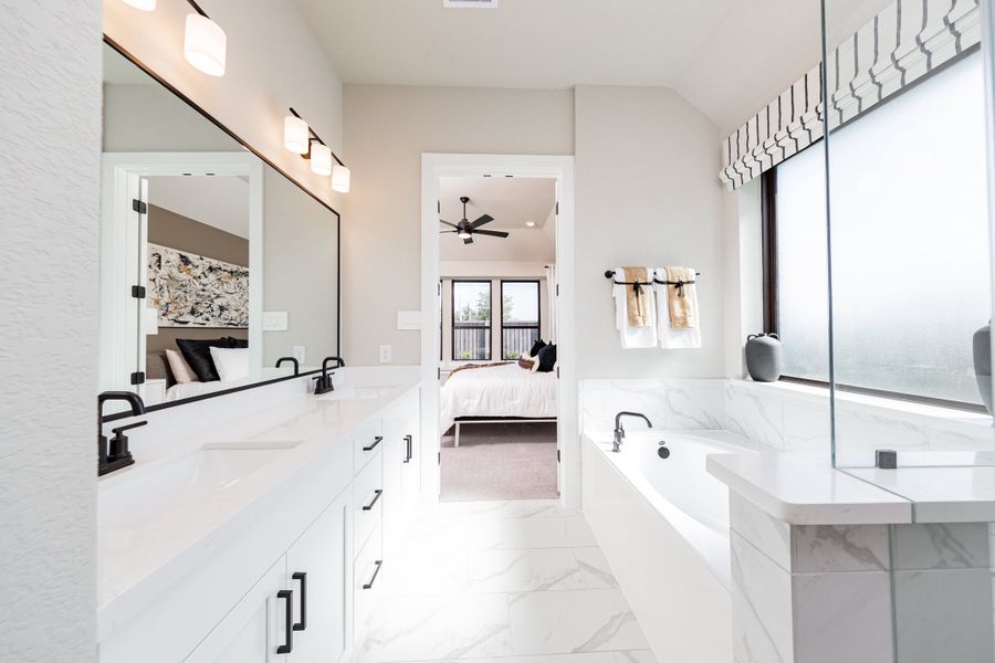 Furnished interior in a model home at Arabella on the Prairie in Richmond (Image 11).