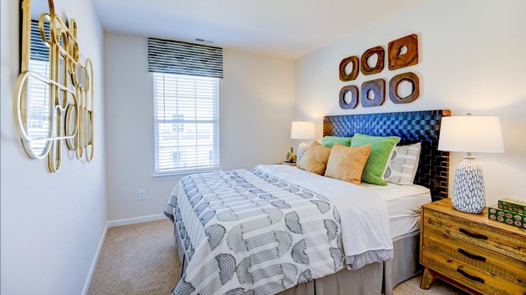 Furnished interior in a model home at Edinborough Townes in Gibsonville (Image 5).