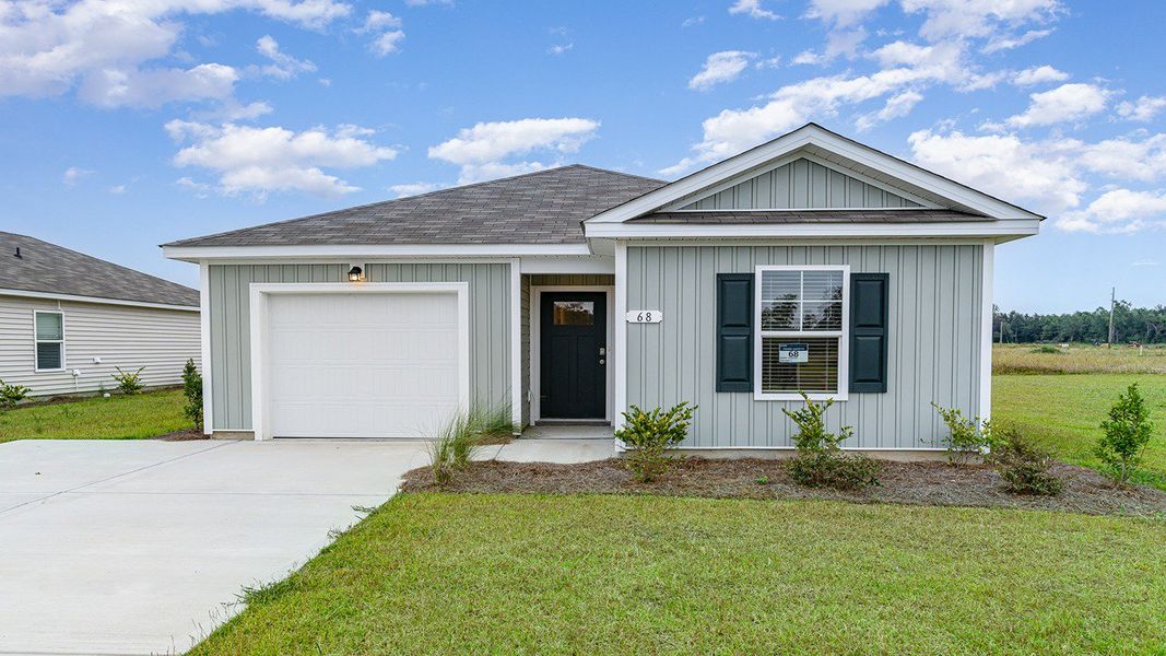Front exterior of a home in the Cottonwood Place community, located in Tabor City, NC (Image 5). Front exterior of a home in the Cottonwood Place community, located in Tabor City, NC (Image 5).