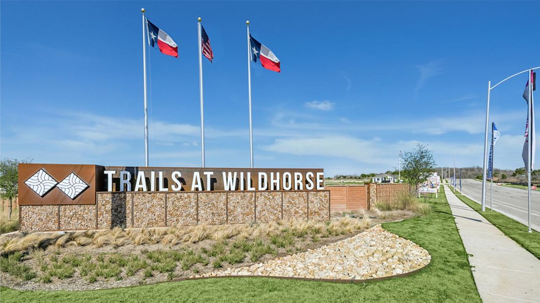 Entrance to the Trails at Wildhorse community in Austin, TX, featuring signage and landscaping (Image 2).