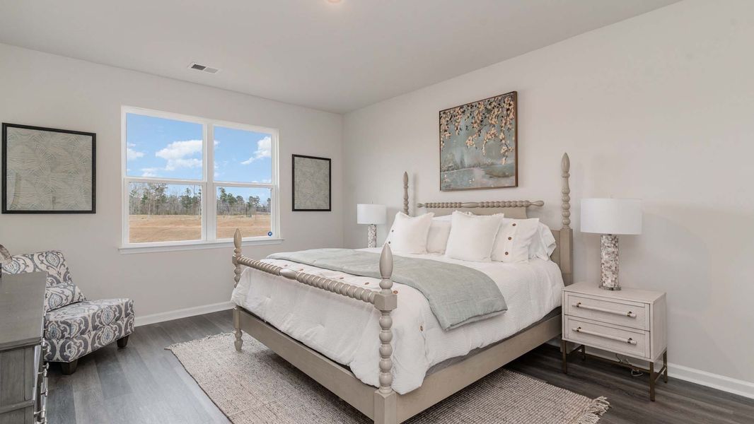 Furnished interior in a model home at Preserve at Cypress Commons in Conway (Image 6).