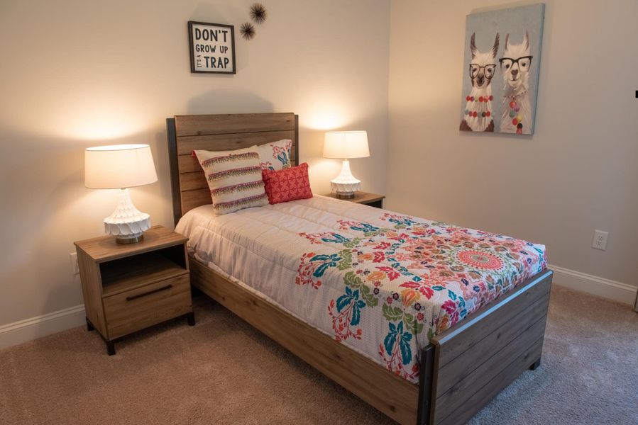 Furnished interior in a model home at Hidden Lake Preserve in Greenville (Image 14).