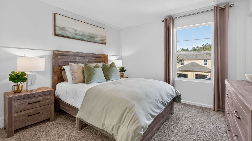 Furnished interior in a model home at Liberty Cove in Yulee (Image 16).