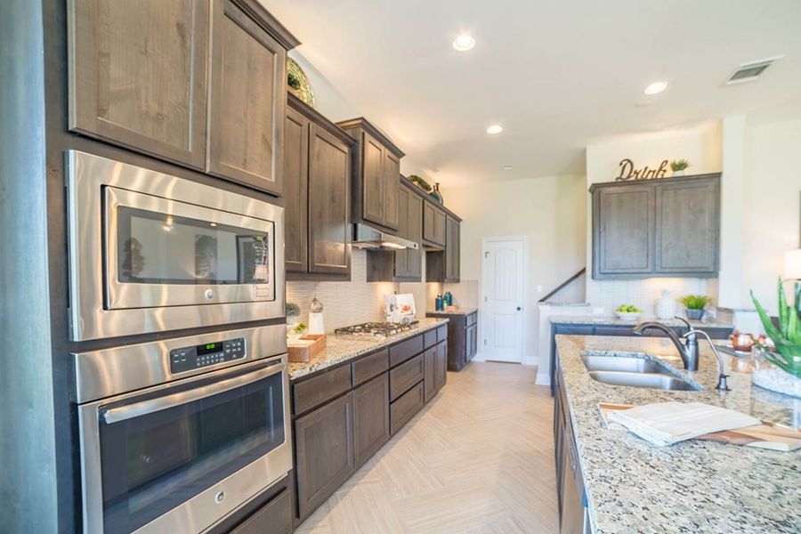 Furnished interior in a model home at Sunfield in Buda (Image 8).