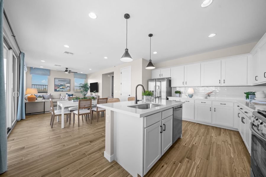 Kitchen, Dining Room & Great Room | Skyline Floorplan | Elara at Moonlight | New Homes in Maricopa, AZ by Landsea Homes