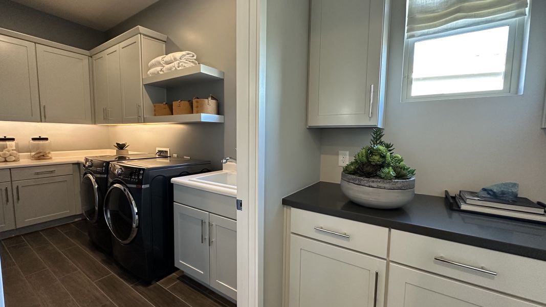 Furnished interior in a model home at CantaMia at Estrella 55+ in Goodyear (Image 11).