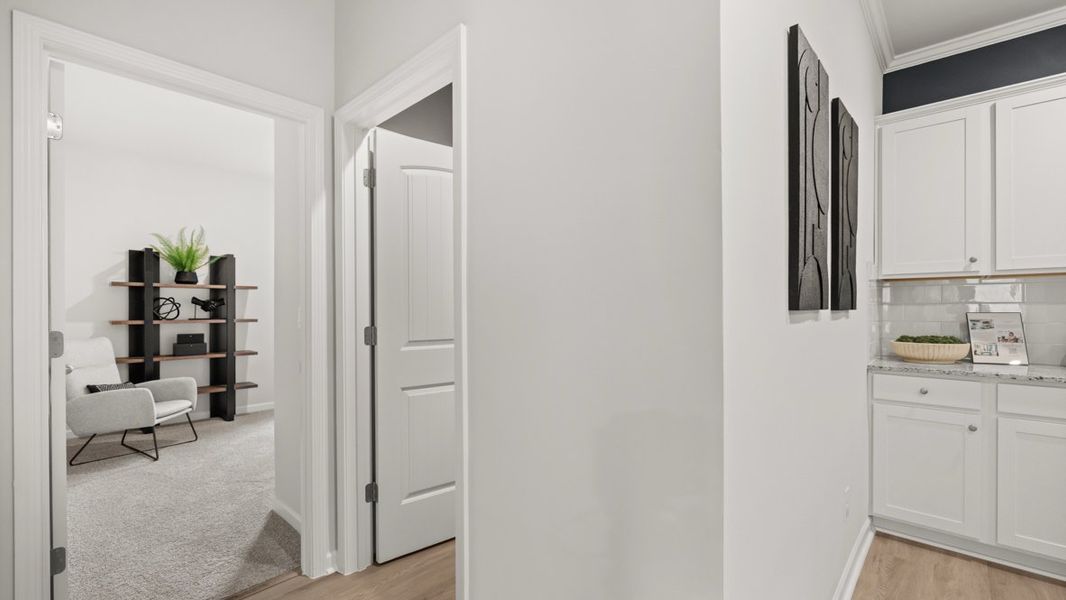 Furnished interior in a model home at Sheffield Highlands in Dallas (Image 27).