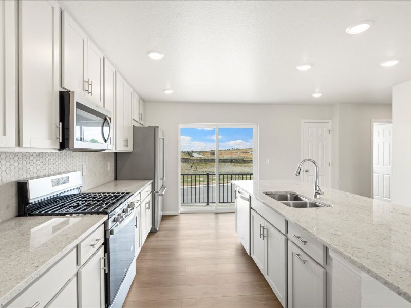 Furnished interior in a model home at Three Hills in Morrison (Image 7).