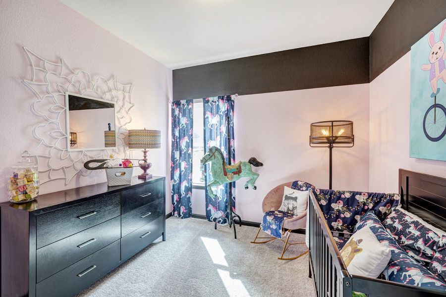 Furnished interior in a model home at Mill Creek Trails in Magnolia (Image 12).