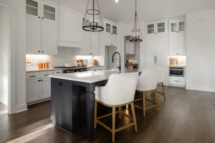 Furnished interior in a model home at Greens Prairie Reserve in College Station (Image 29).