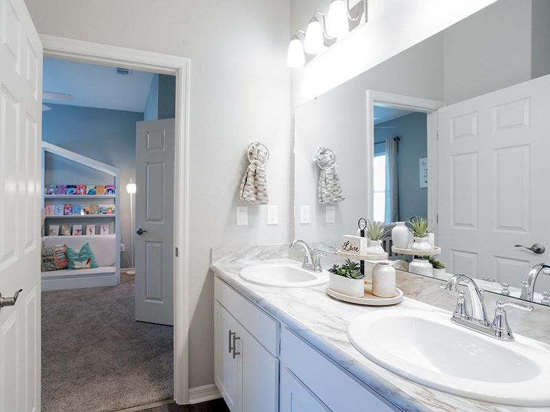 Enjoy thoughtful features, such as this Jack-and-Jill bath - Shelby model home in Auburndale, FL