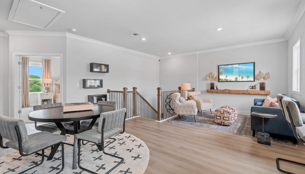 Furnished interior in a model home at Summerlin in Winder (Image 40).